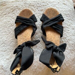 UGG wedge heels. They are a women’s size 7.5.